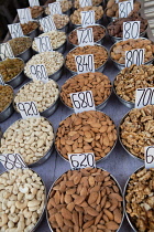 India, New Delhi, Display of nuts at the spice market in the old city of Delhi.
