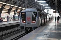 India, New Delhi, Metro train at Ramakrishna Ashram Marg metro station.