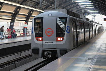 India, New Delhi, Metro train at Ramakrishna Ashram Marg metro station.