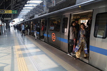 India, New Delhi, Metro train at Ramakrishna Ashram Marg metro station.