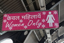 India, New Delhi, Sign for the women only section of the metro train at Ramakrishna Ashram Marg metro station.