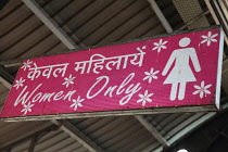 India, New Delhi, Sign for the women only section oif the metro train at Ramakrishna Ashram Marg metro station.