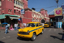 India, West Bengal, Kolkata, Taxi in front of Howrah Railway Station.