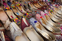 India, West Bengal, Kolkata, Display of traditional ladies footwear mojaris and jootis in a shop in New Market.