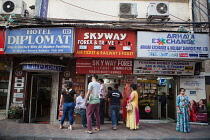 India, West Bengal, Kolkata, Travel agents, money changers, and hotels on Sudder Street,.