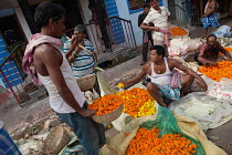 India, West Bengal, Kolkata, Malik Ghat flower market.