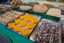 India, West Bengal, Kolkata, Display of indian sweets in a shop.