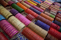 India, West Bengal, Kolkata, Bangles on display in a shop in the Bara Bazar district.