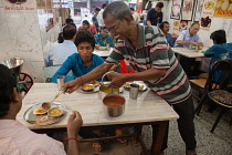 India, West Bengal, Kolkata, A food hotel in the New Market district.