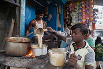 India, West Bengal, Kolkata, Chai vendor.