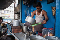 India, West Bengal, Kolkata, Chai vendor.