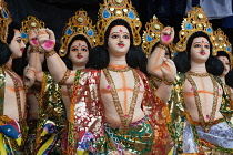 India, West Bengal, Bardhaman, Statues of Hindu gods for sale.