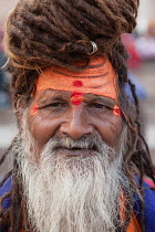 India, Uttar Pradesh, Varanasi, Portrait of a saddhu.