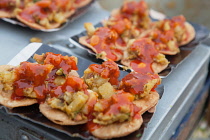 India, Uttar Pradesh, Varanasi, Street food, vegetables on kachoris.