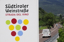 Italy, Trentino Alto Adige, Strada di Vino sign & road.