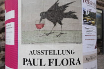 Italy, Trentino Alto Adige, Strada del Vino, poster of local artist Paul Flora, buried in Glorenza.
