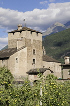 Italy, Valle d'Aosta, Saint Pierre, Sarriod de la Tour Castle surrounded by vines.