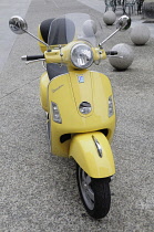 Italy, Lombardy, Lake Como, Como, yellow vespa.