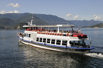 Italy, Lombardy, Lake Como, Varenna, ferry leaving .