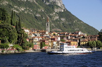 Italy, Lombardy, Lake Como, Varenna with ferry passing.