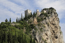 Italy, Trentinto Alto Adige, Lake Garda, Arco, looking up to Arco Castle & cliff.