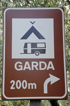 Italy, Lombardy, Lake Garda, accommodation road sign.