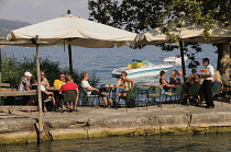 Italy, Lombardy, Lake Garda, San Vigilio, dining at Punta di San Vigilio.