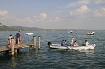 Italy, Lombardy, Lake Garda, San Vigilio, bathing & boating at Punta di San Vigilio.