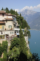 Italy, Lombardy, Lake Garda, Tremosine, Pieve on cliff edge.