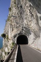Italy, Lombardy, Lake Garda, Tremosine, tunnel & road climbing to village of Pieve.