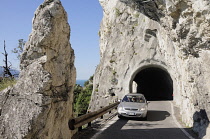 Italy, Lombardy, Lake Garda, Tremosine, tunnel & road climbing to village of Pieve.