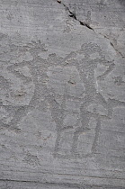Italy, Lombardy, Valcamonica, Foppi di Nadro, 1000BC rock carvings depicting battles.