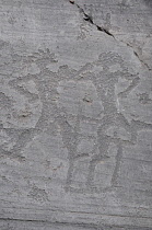 Italy, Lombardy, Valcamonica, Foppi di Nadro, 1000BC rock carvings depicting battles.