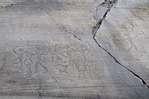 Italy, Lombardy, Valcamonica, Foppi di Nadro, 1000BC rock carvings depicting battles.