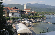 Italy, Piemonte, Lake Maggiore, Feriolo, village & lakeside beach.