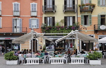 Italy, Piemonte, Lake Maggiore, Intra -Verbania, street scene with cafes.