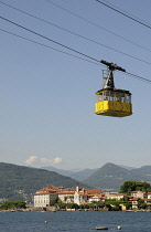 Italy, Piemonte, Lake Maggiore, Stresa, cable car above lake with Isola Bella in background.