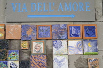 Italy, Liguria,Cinque Terre, Riomaggiore, Via Dell'Amore sign with tiles.