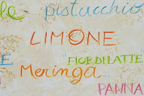 Italy, Liguria, Cinque Terre, Monterosso, ice cream board detail, flavours.
