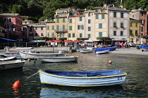Italy, Liguria, Portofino, bay with boats & waterside view..