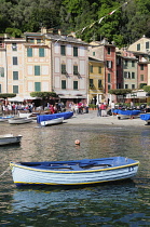 Italy, Liguria, Portofino, bay with boats & waterside view.