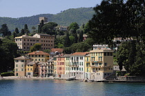 Italy, Liguria, Portofino Peninsula, colourful houses & waterfront near Portofino.