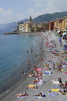 Italy, Liguria, Camogli, beach scene & waterfront.