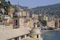 Italy, Liguria, Camogli, church roof with views of Camogli beach & waterfront.