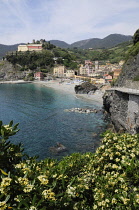 Italy, Liguria, Cinque Terre, Monterosso, view along coastline to Monterosso with beaches.