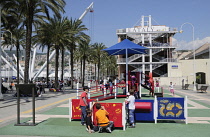 Italy, Liguria, Genoa, Porto Antico, playground & esplanade.