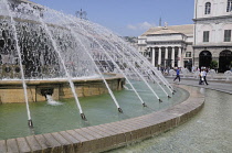 Italy, Liguria, Genoa, fountain on Piazzale Pertini with Teatro Carlo Felice behind.