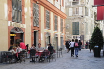 Italy, Liguria, Genoa, cafes on Via Garibaldi.