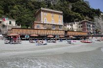 Italy, Liguria, Cinque Terre, Monterosso, hotel & beach scene.