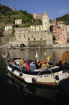 Italy, Liguria, Cinque Terre, Vernazza, harbour with fishing boat.